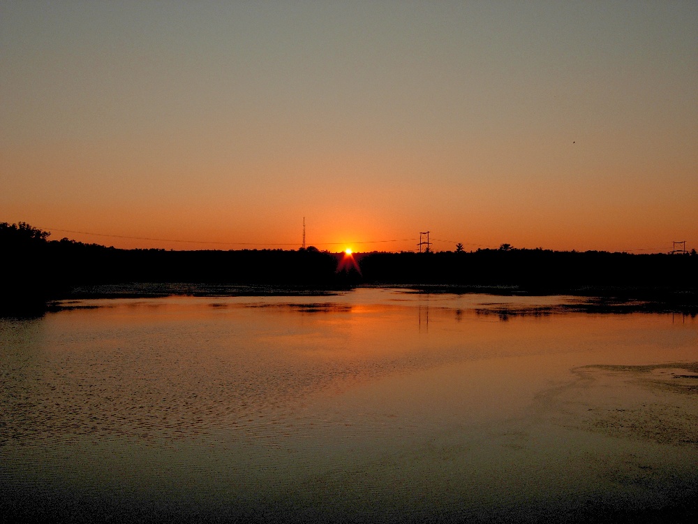 sun set cleveland pond near Abington