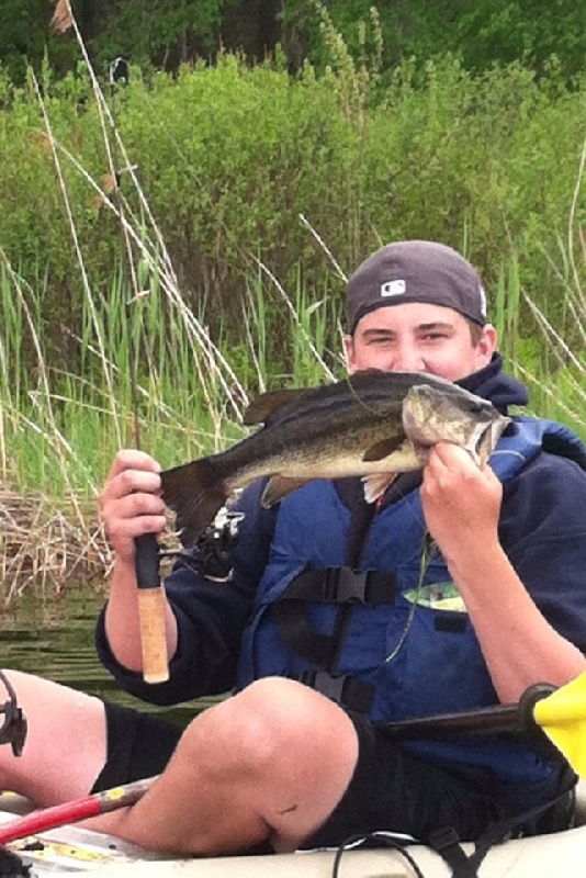 Small bass caught with ice fishing rod and 2 pound line