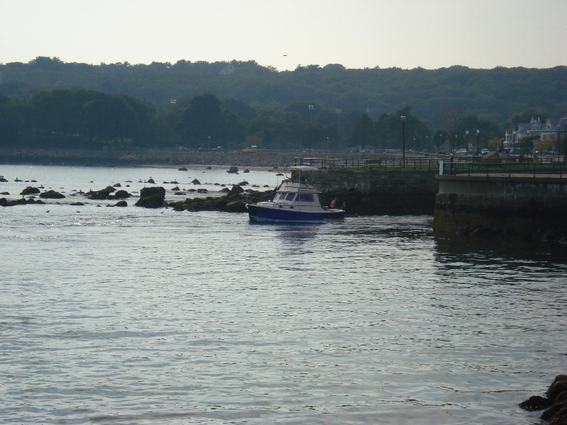 Fishing boat cruising by near Gloucester